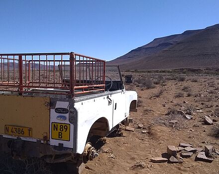 Picture of derelict car in arid landscape of southern Namibia